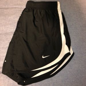 Black with white stars Nike running shorts